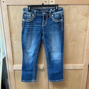 Miss Me mid-rise easy crop jeans. 26 x 23
